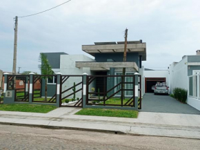Casa em Capão com piscina